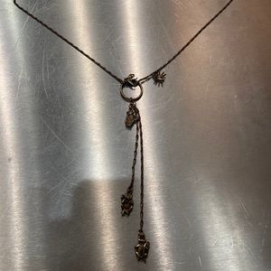 lariat necklace with detailed charms